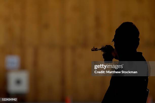 World recod holder and Olympic gold medalist Jongoh Jin of South Korea competes in the men 50m Pistol competition during the International Shooting...