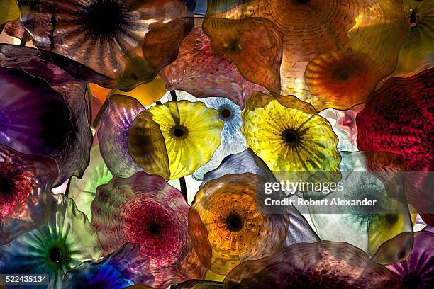 An art installation by glass artist Dale Chihuly titled 'Flori di Como' hangs from the lobby ceiling at the Bellagio hotel and casino in Las Vegas,...