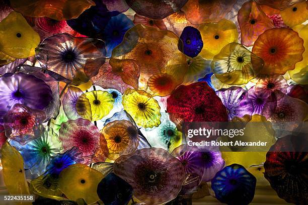 An art installation by glass artist Dale Chihuly titled 'Flori di Como' hangs from the lobby ceiling at the Bellagio hotel and casino in Las Vegas,...