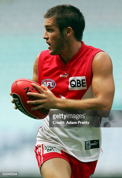 Josh Willoughby of the Swans in action during the trial AFL match between the Sydney Swans and the Brisbane Lions on February 26, 2005 at Telstra...