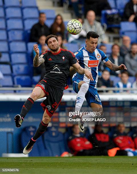 Celta's defender Carles Planas vies with Espanyol's Paraguayan midfielder Hernan Perez during the Spanish league football match Real CD Espanyol vs...