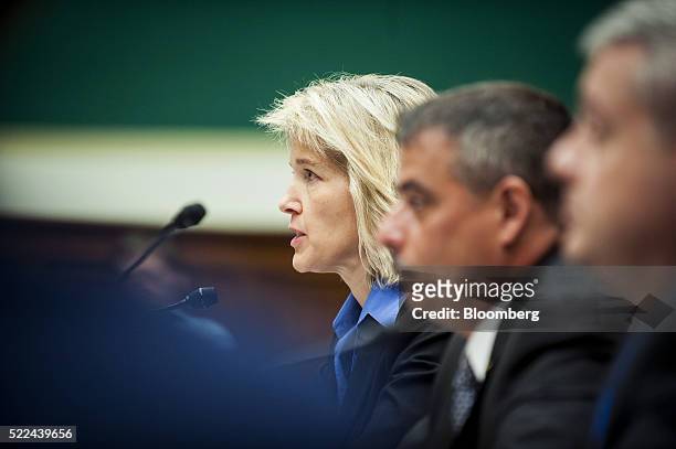 Amy Hess, executive assistant director for science and technology at the Federal Bureau of Investigation , left, speaks at a House Energy and...