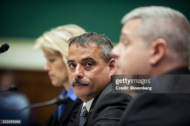 Thomas Galati, chief of the intelligence bureau at the New York City Police Department , center, listens during a House Energy and Commerce...