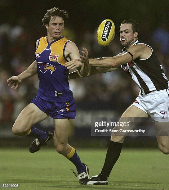 Rowan Jones of West Coast and Ryan Lonie of Collingwood in action during the AFL Wizard Cup quarter finals between Collingwood Magpies and West Coast...