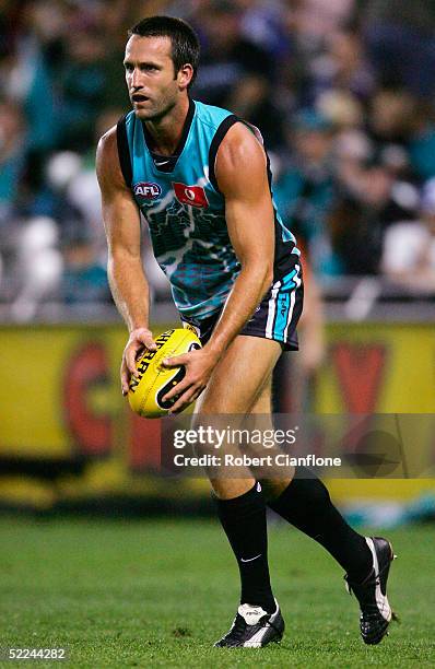 Darryl Wakelin of Port Adelaide in action during the quarter finals of the Wizard Cup AFL match between the Kangaroos and Port Adelaide at the...