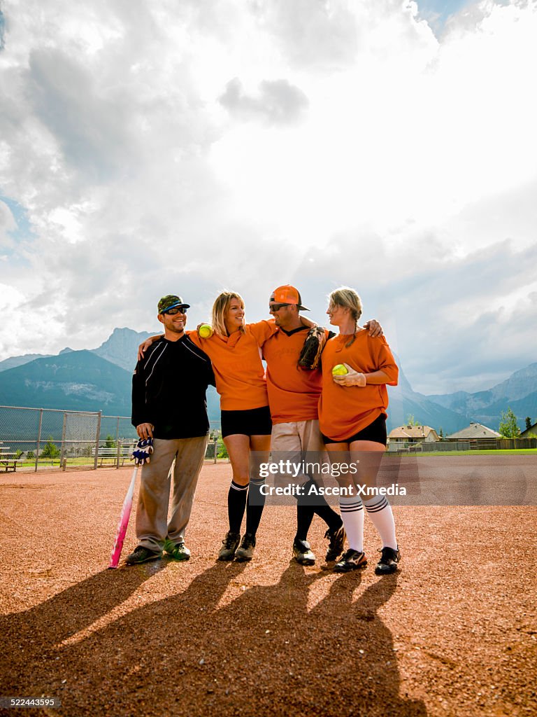 Portrait of baseball team in mid-field, recreation