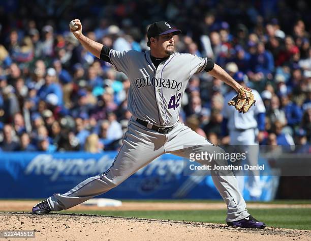 Chad Qualls of the Colorado Rockies pitches against the Chicago Cubs at Wrigley Field on April 15, 2016 in Chicago, Illinois. All players are wearing...