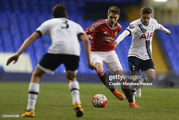 Guillermo Varela of Manchester United U21s in action with Joe Pritchard of Tottenham Hotspur U21s during the Barclays U21 Premier League match...