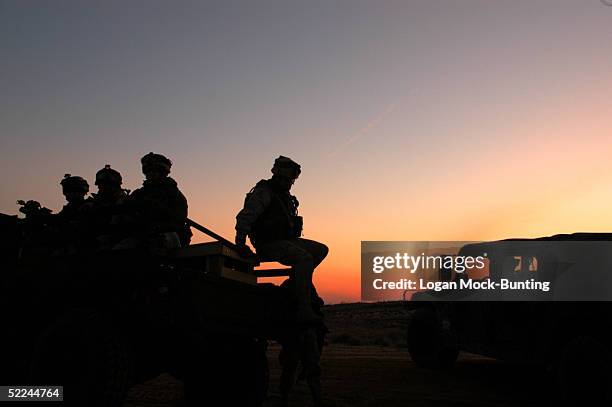 Members of the 504th Parachute Infantry Regiment, Delta Company, participate in a security convoy for civil recunstruction teams during CERTEX...