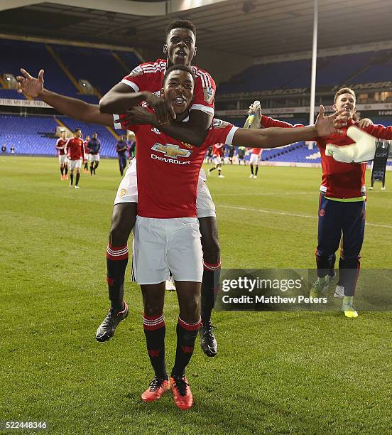 Axel Tuanzebe and Ro-Shaun Williams of Manchester United U21s celebrate winning the U21s League after the Barclays U21 Premier League match between...