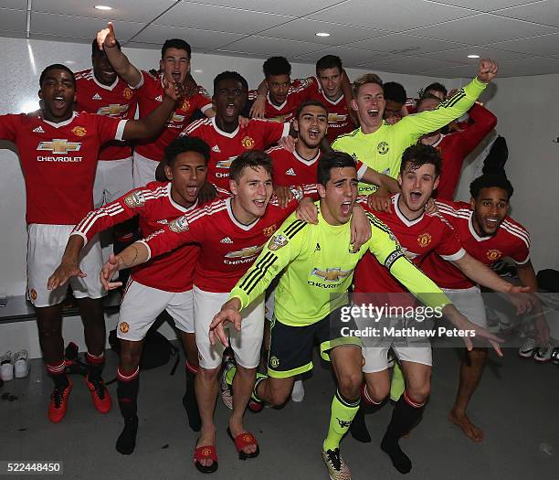 The Manchester United U21s squad celebrate winning the U21s League after the Barclays U21 Premier League match between Tottenham Hotspur U21s and...