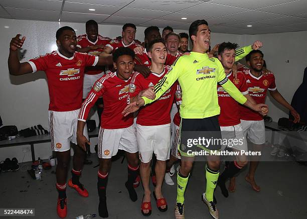 The Manchester United U21s squad celebrate winning the U21s League after the Barclays U21 Premier League match between Tottenham Hotspur U21s and...