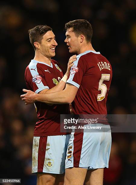 Goalscorer Michael Keane of Burnley is congratulated by teammate Stephen Ward folloing the final whistle during the Sky Bet Championship match...