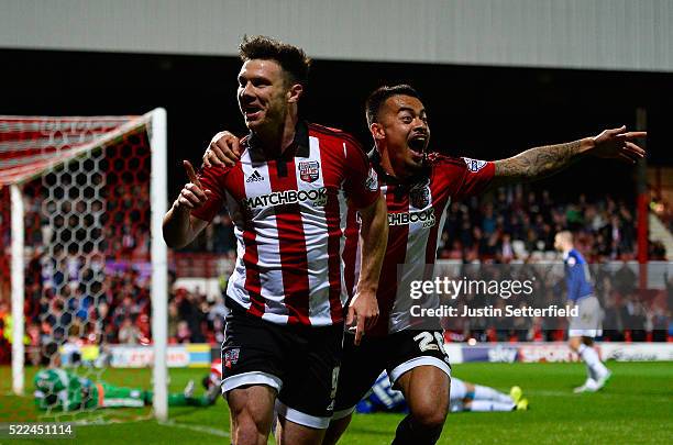 Scott Hogan of Brentford FC celebrates scoring the 1st brentford goal with Nico Yennaris of Brentford FC during the Sky Bet Championship match...