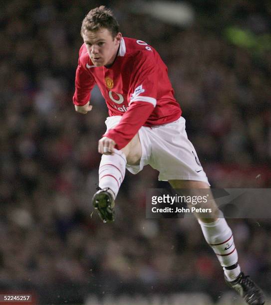 Wayne Rooney of Manchester United tries a shot during the Barclays Premiership match between Manchester United and Portsmouth at Old Trafford on...