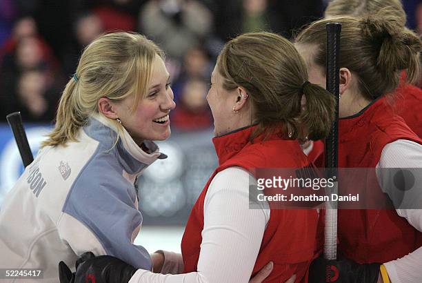 McFARLAND, WI Skip Cassie Johnson celebrates with her teammates after winning an automatic berth to the 2006 Winter Olympics in Torino, Italy by...
