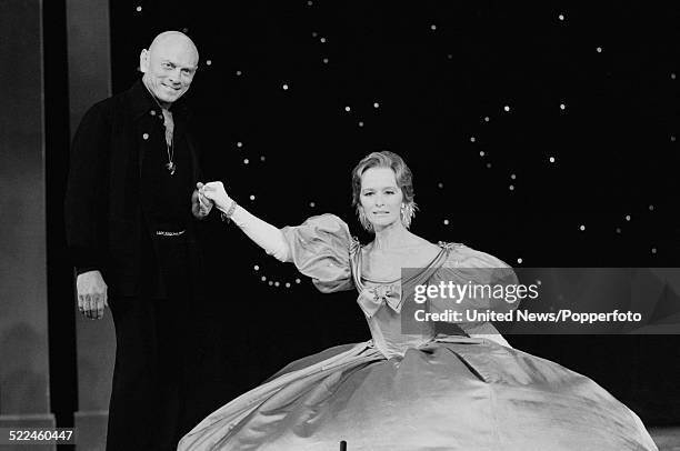 Russian born actor Yul Brynner pictured with English actress Virginia McKenna at a press call to promote the musical The King and I at the Palladium...