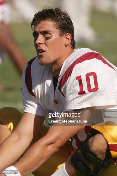 Matt Cassel of the USC Trojans stretches prior to the game against the Stanford Cardinal on September 25, 2004 at Stanford Stadium in Palo Alto,...