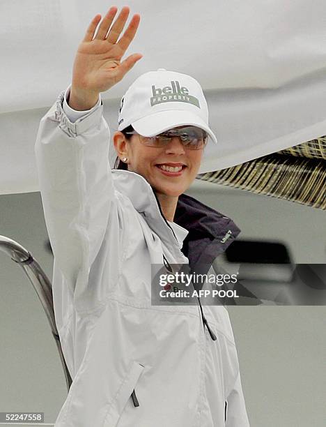Crown Prince Frederik of Denmark's Australian wife, Princess Mary waves as she departs for a yacht race against her husband on Sydney harbor,...