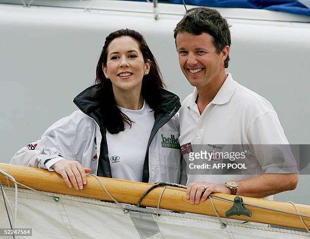 Crown Prince Frederik of Denmark, right, and his Australian wife, Princess Mary pose for a photograph before they departed for a yacht race against...