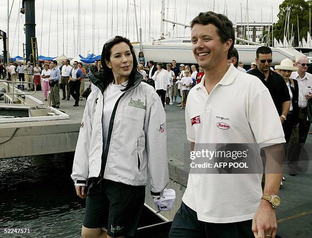 Crown Prince Frederik of Denmark, right, and his Australian wife, Princess Mary arrive at the docks for a yacht race against each other on Sydney...