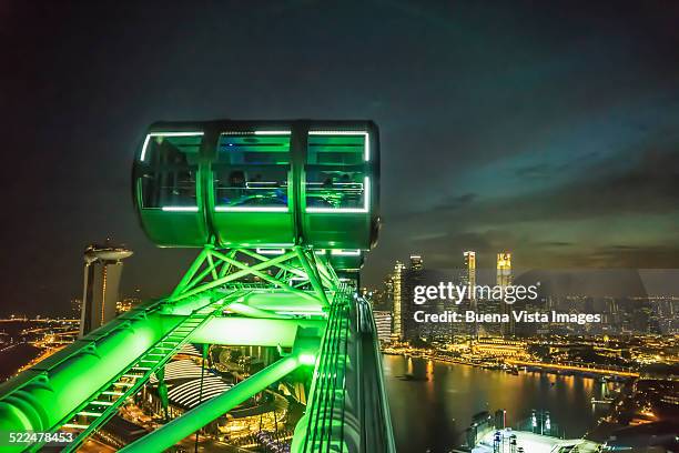 singapore flyer wheel singapore bay - singapore flyer - fotografias e filmes do acervo