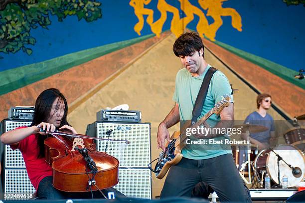 Joe Kwon and Bob Crawford of The Avett Brothers performing at the New Orleans Jazz and Heritage Festival in New Orleans, Louisiana on April 29, 2011.