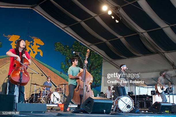 Joe Kwon, Bob Crawford, Scott Avett and Seth Avett of The Avett Brothers performing at the New Orleans Jazz and Heritage Festival in New Orleans,...