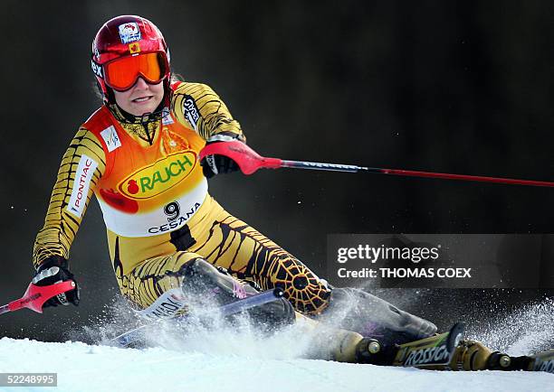 Canada's Brigitte Acton clears a gate during the women's ski World Cup combined slalom race in San Sicario, 27 February 2005. Croatia's Janica...