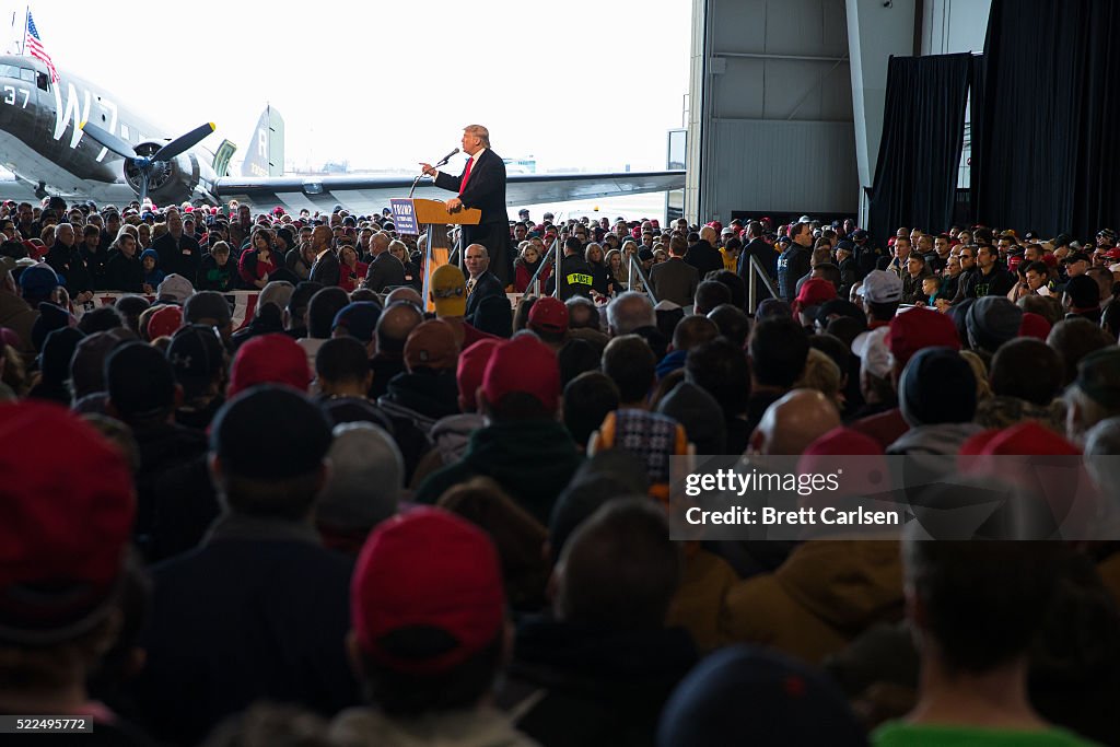 Trump In Crowd Presidential candidate Donald Trump speaks before a capacity crowd at ...