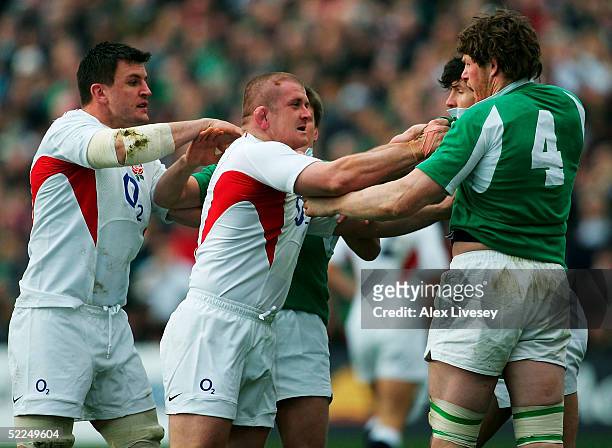 Graham Rowntree of England confronts Malcolm O'Kelly of Ireland during the RBS Six Nations Championship match between Ireland and England at...