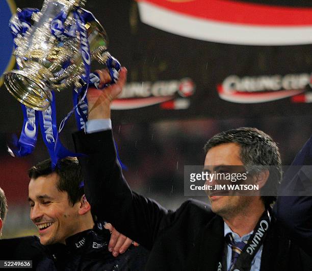United Kingdom: Chelsea's manager Jose Mourinho raises the Carling Cup trophy after defeating Liverpool in ther Carling Cup Final football match at...