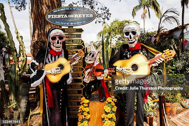 Life Sized Skeleton Day of the Dead Statues Playing Guitars And With Rabbit With Violin in Old Town San Diego, California in Preparation For The...