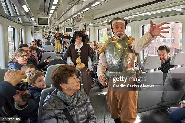Actors perform scenes from "Don Quixote" in the train Madrid - Alcala de Henares in occasion of the 400th anniversary of the death of Miguel de...