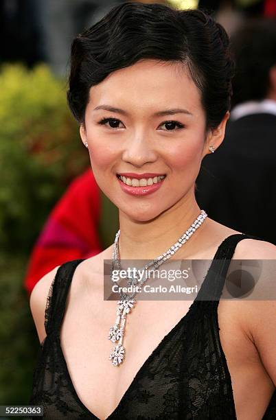 Ziyi Zhang arrives on the red carpet wearing jewelry by Bvlgari at the 77th Annual Academy Awards at the Kodak Theater on February 27, 2005 in...