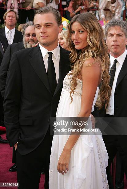 Actor Leonardo DiCaprio, nominated for Best Actor for his role in "The Aviator," arrives with girlfriend Brazilian model Gisele Bundchen at the 77th...