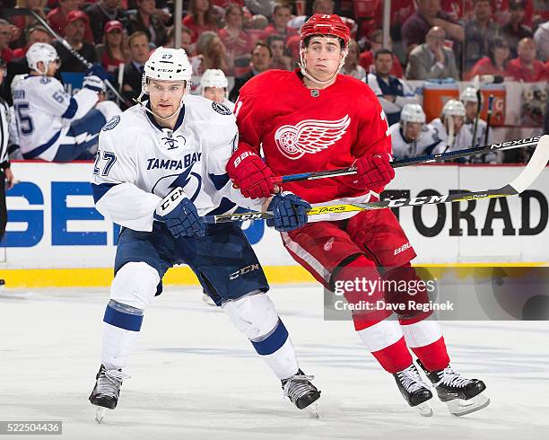 Dylan Larkin of the Detroit Red Wings battles for position with Jonathan Drouin of the Tampa Bay Lightning in Game Four of the Eastern Conference...