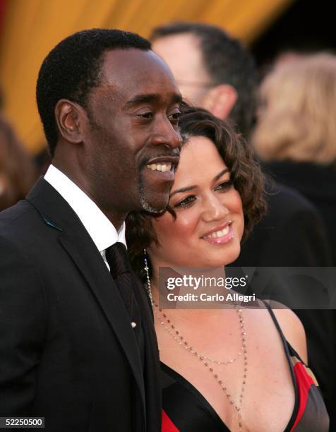 Don Cheadle and his wife Bridgid Coulter arrive for the 77th Annual Academy Awards at the Kodak Theater on February 27, 2005 in Hollywood, California.
