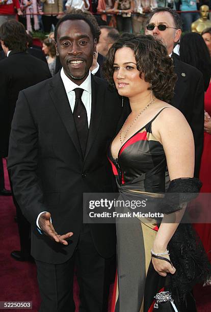 Actor Don Cheadle, nominated for Best Actor for his role in "Hotel Rwanda," and wife Bridgid Coulter arrive at the 77th Annual Academy Awards at the...