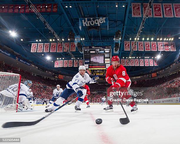 Justin Abdelkader of the Detroit Red Wings battles for the puck with Victor Hedman of the Tampa Bay Lightning in Game Four of the Eastern Conference...