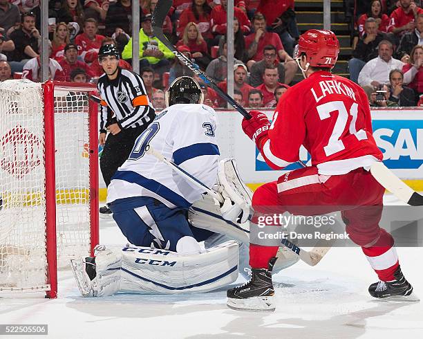Dylan Larkin of the Detroit Red Wings hits the crossbar behind Ben Bishop of the Tampa Bay Lightning late in the third period in Game Four of the...