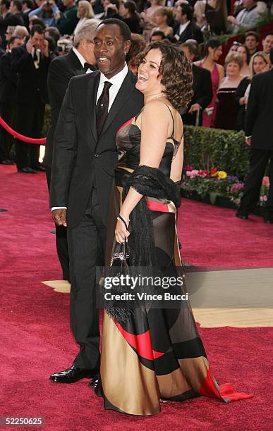 Actor Don Cheadle nominated for Best Actor in a Leading Role for his performance in "Hotel Rwanda" arrives with his wife Bridgid Coulter to the 77th...