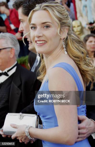 United States: Actress Kate Winslet, nominated for Best Actress for her role in "Eternal Sunshine of the Spotless Mind," arrives for the 77th Academy...