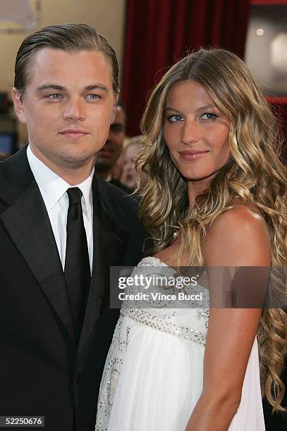 Actor Leonardo DiCaprio, nominated for Best Actor for his role in "The Aviator," arrives with girlfriend Brazilian model Gisele Bundchen at the 77th...