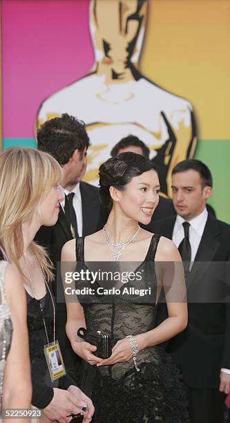 Actress Ziyi Zhang wearing Bvlgari arrives at the 77th Annual Academy Awards at the Kodak Theater on February 27, 2005 in Hollywood, California.