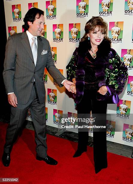 Actress Joan Collins and her husband Percy Gibson attend the official New York celebration of the Academy Awards at Gabriel's February 27, 2005 in...