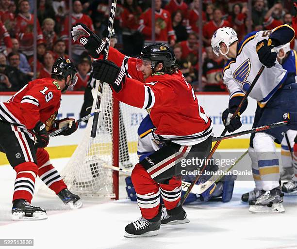 Duncan Keith of the Chicago Blackhawks celebrates his second period goal against the St. Louis Blues in Game Four of the Western Conference First...