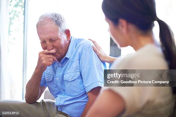 coming to grips with loss - family hospital old stockfoto's en -beelden