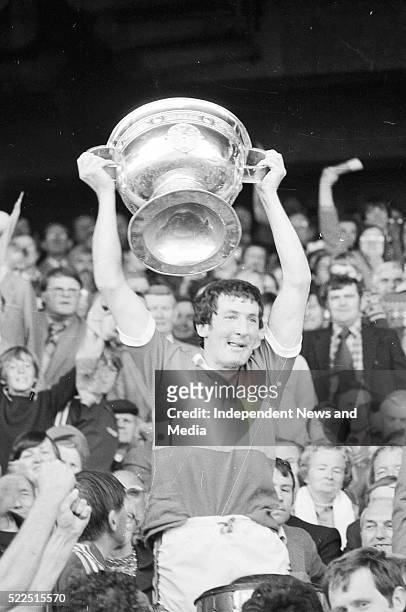 Kerry captain Tim Kennelly lifts the Sam Maguire cup after they defeated Dublin in the 1979 All-Ireland final at Croke Park, circa September 1979. .