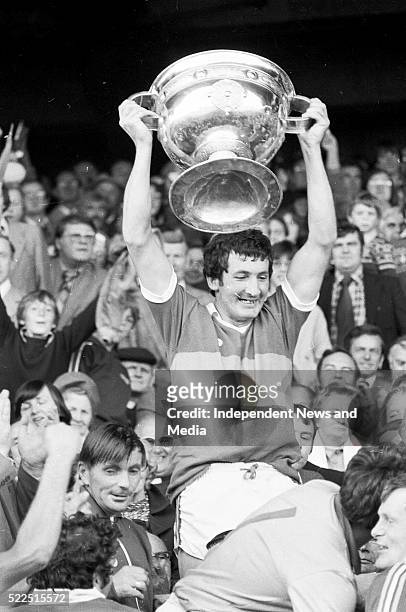 Kerry captain Tim Kennelly lifts the Sam Maguire cup after they defeated Dublin in the 1979 All-Ireland final at Croke Park, circa September 1979. . .